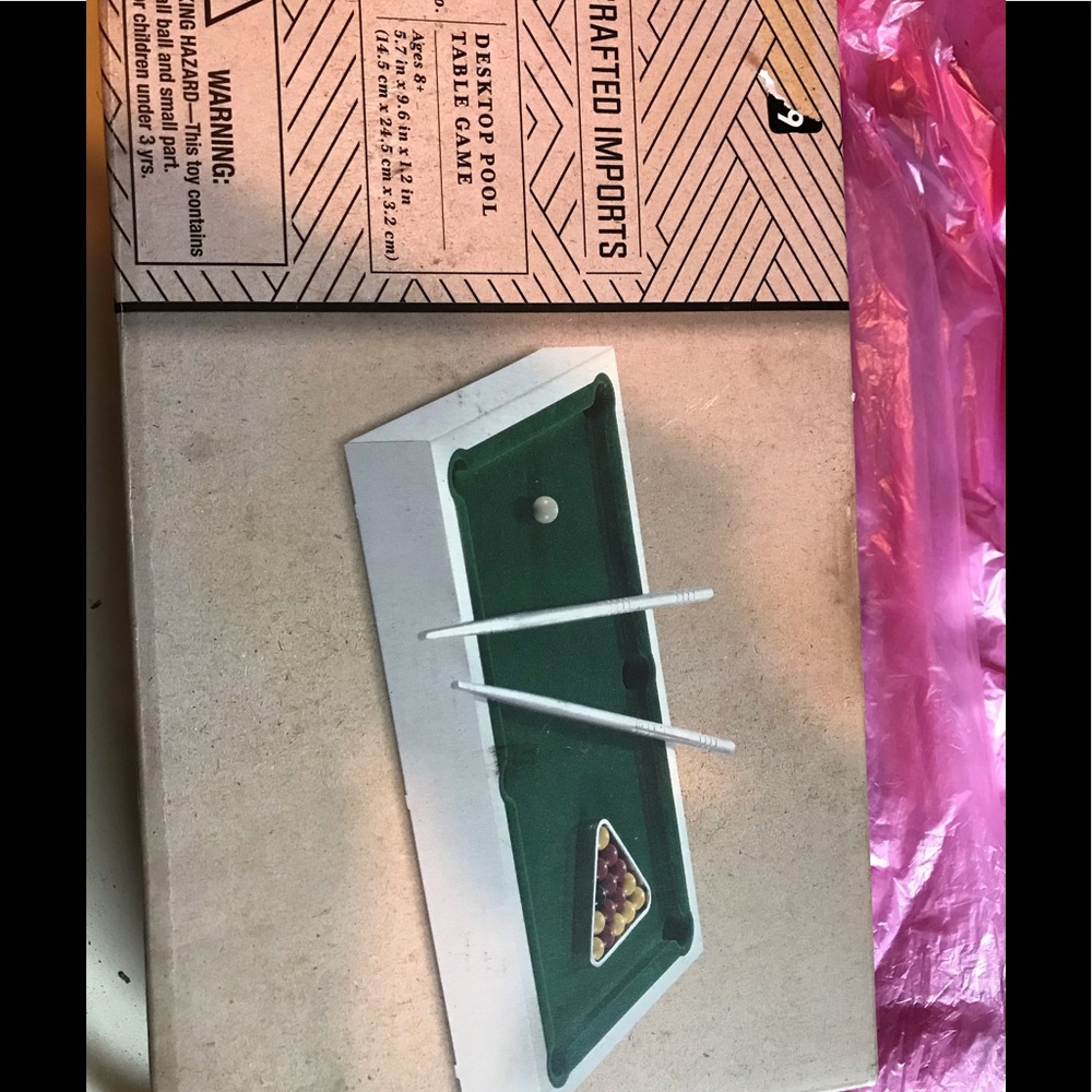 Desktop pool table never opened